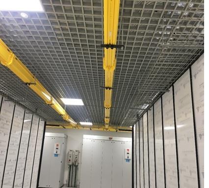 Yellow fiber runner raceway over server racks